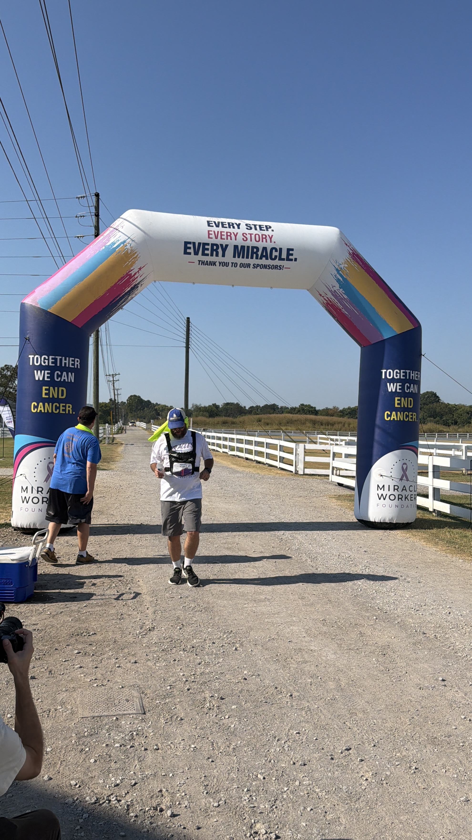 Doug Crossing the Finish Line of the Miracle Worker Foundation 5k